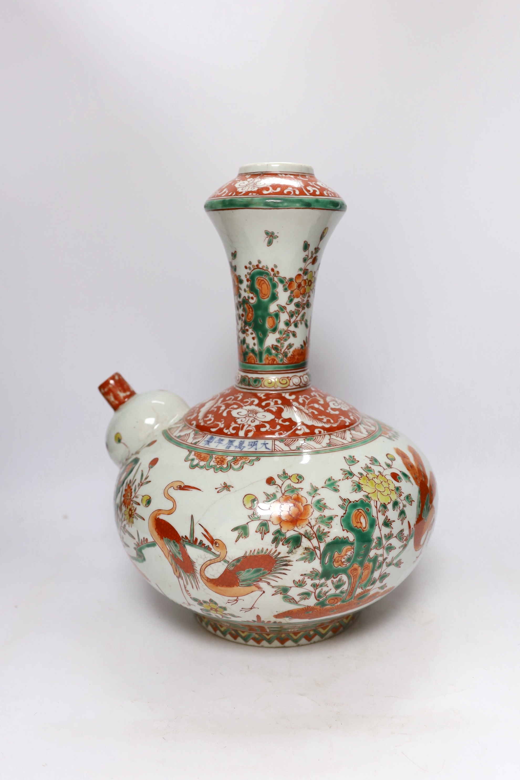 A Chinese famille verte wine pitcher, 20th century, 39cm high